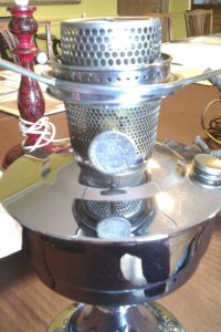 This kerosene lamp was purchased around 1930, indicating that even after electrification alternative sources of lighting were still useful.